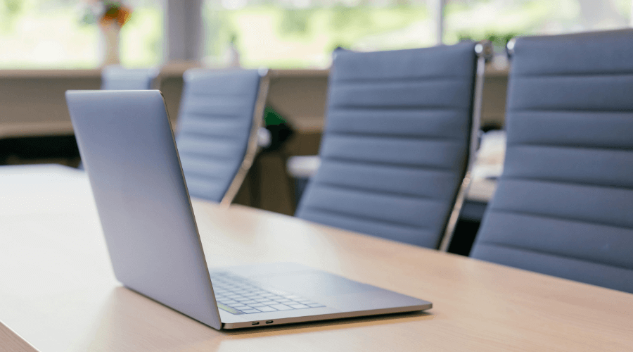 laptop on conference room table